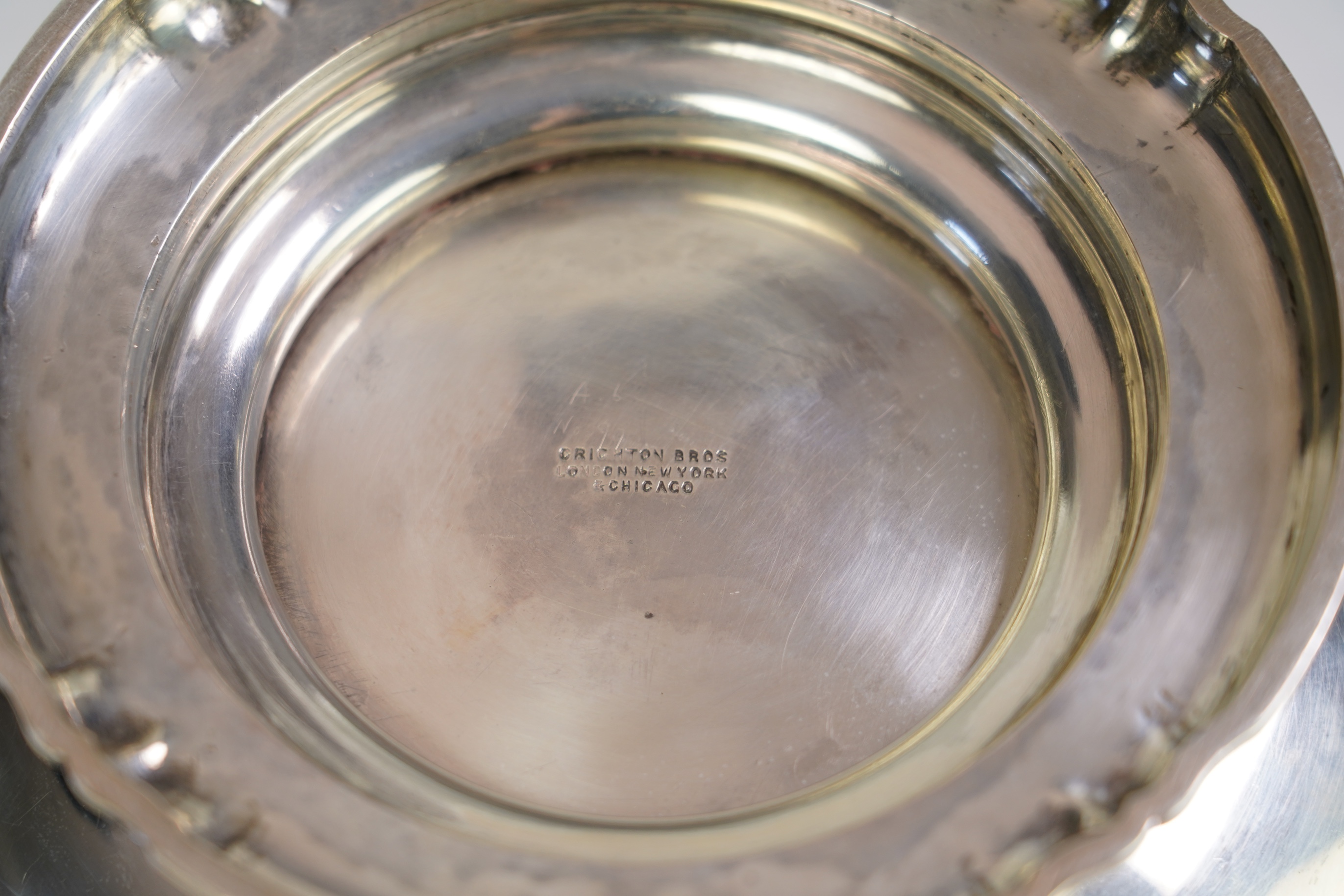 A George V silver two handled pedestal bowl, by Crichton Brothers
